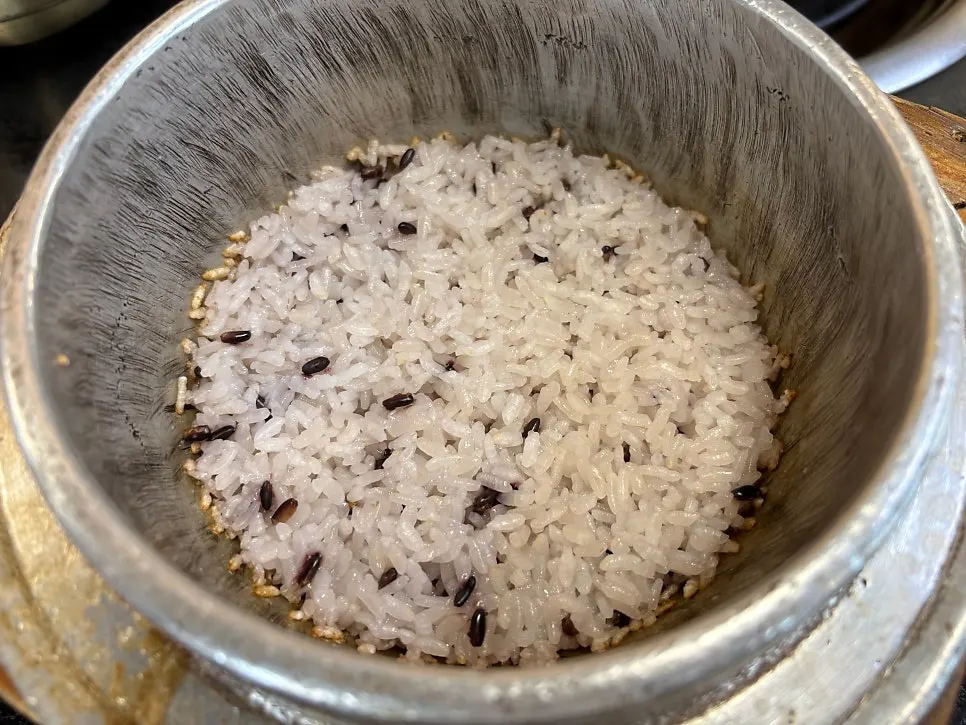 Stone pot rice served alongside the kimchi stew