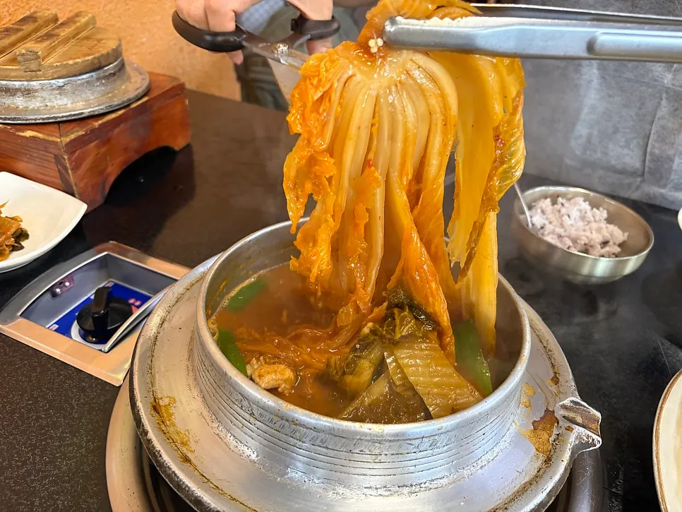 Cauldron galbi kimchi stew bubbling hot