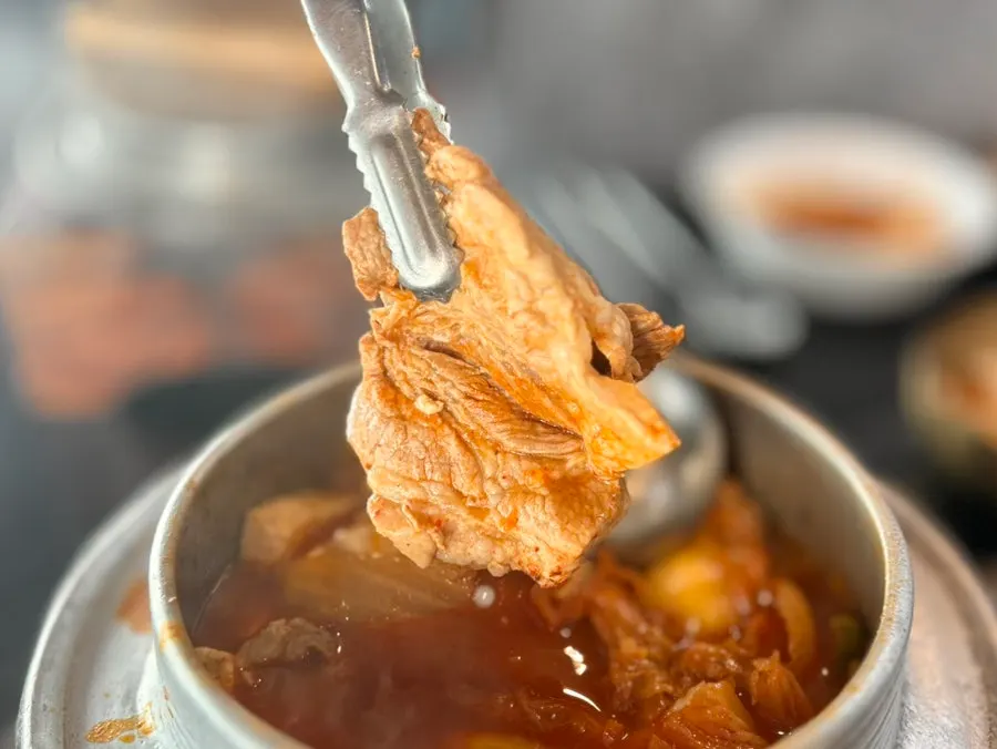 Pot of kimchi stew with short rib inside