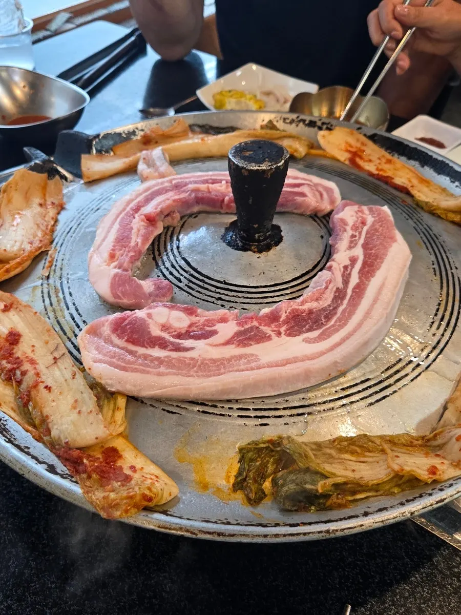 Close-up of grilled pork belly with fat attached
