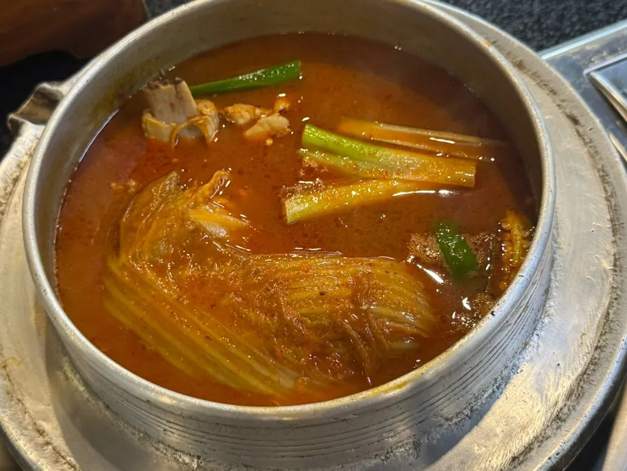 Cast-iron galbi kimchi stew for two, table setup