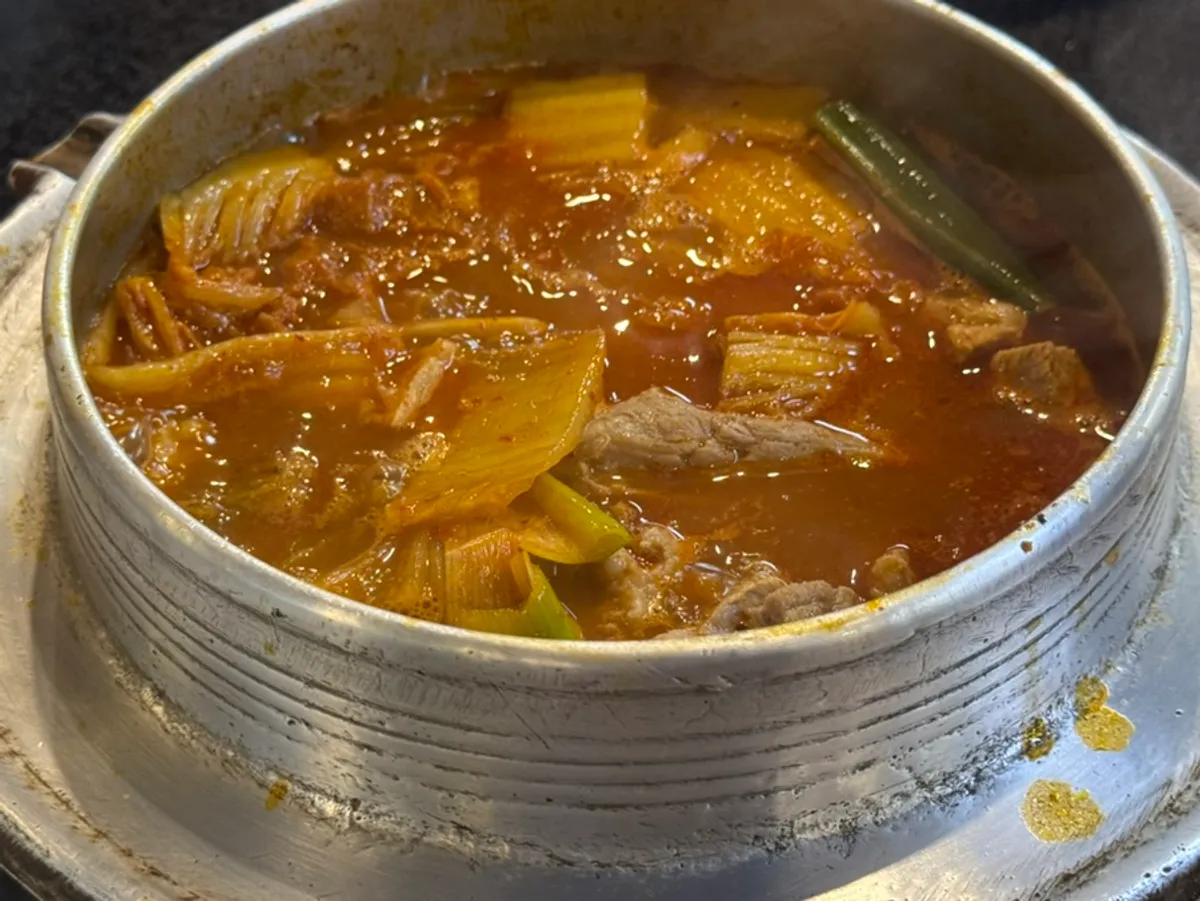 Galbi kimchi stew bubbling on the boil