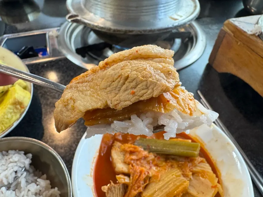 Anchovy-broth kimchi stew served with rice