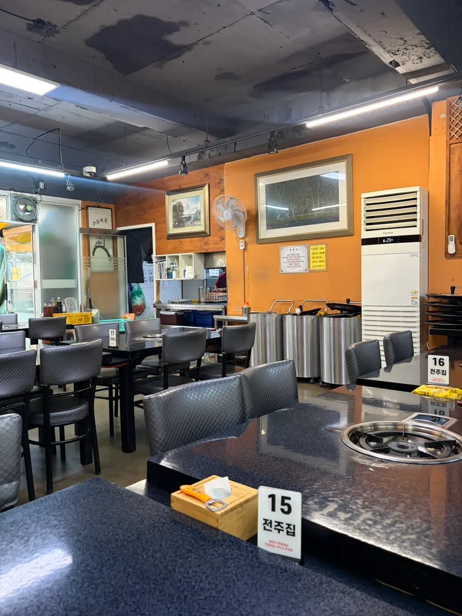 Spacious table seating inside Jeonju House