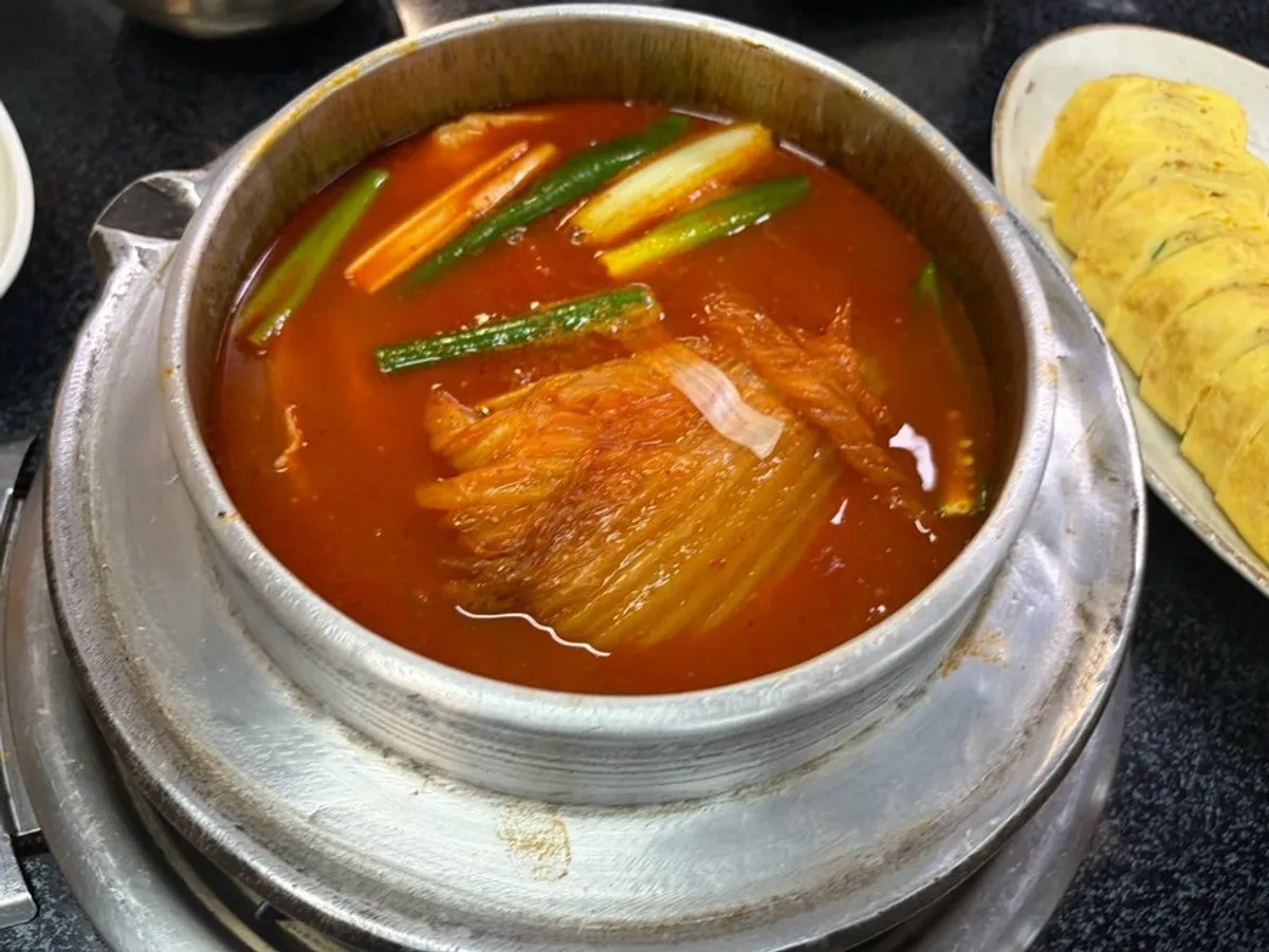 Cast-iron pot with water added to make rice crust tea