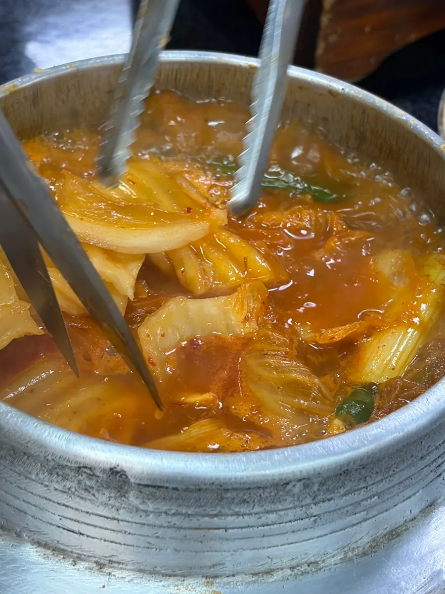 Jeonju House's galbi kimchi stew bubbling away