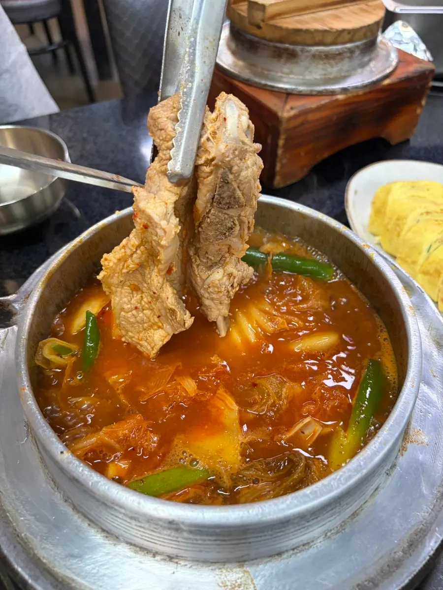 Close-up of the simmering galbi kimchi stew