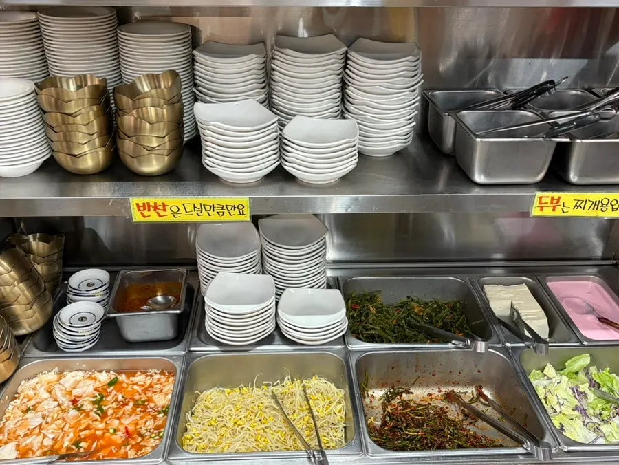 Korean side dishes ready at the self-serve corner