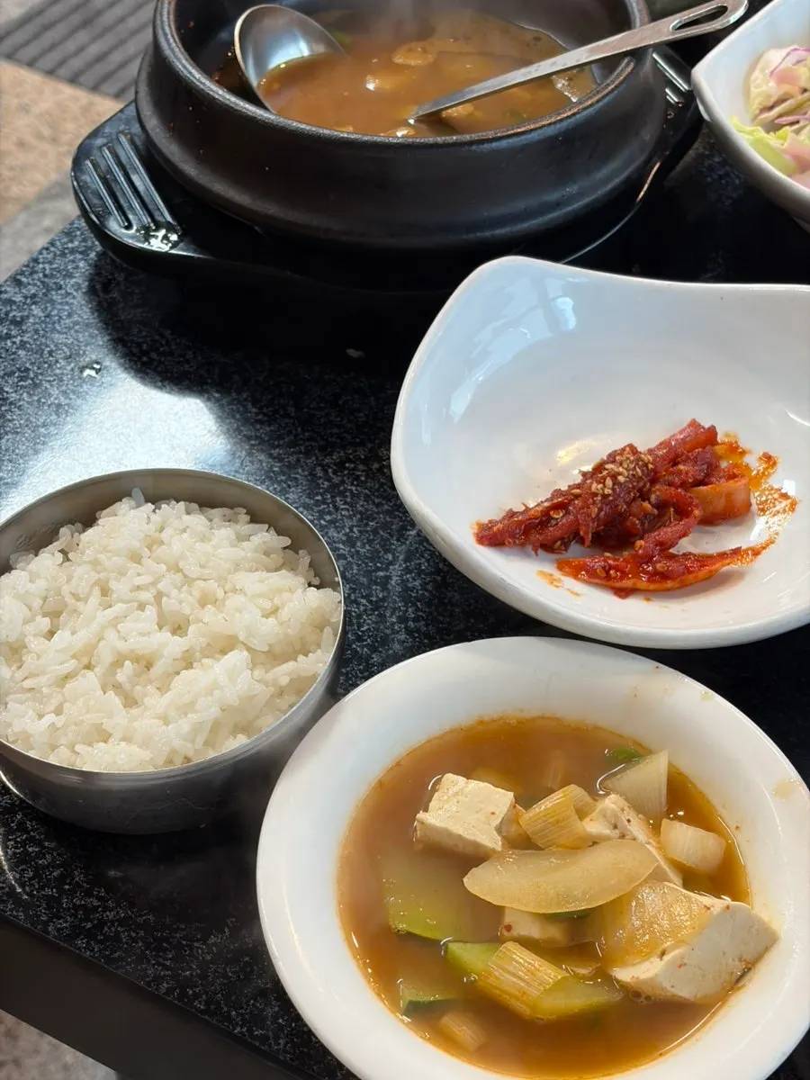 A stone pot of doenjang jjigae with an anchovy-broth feel