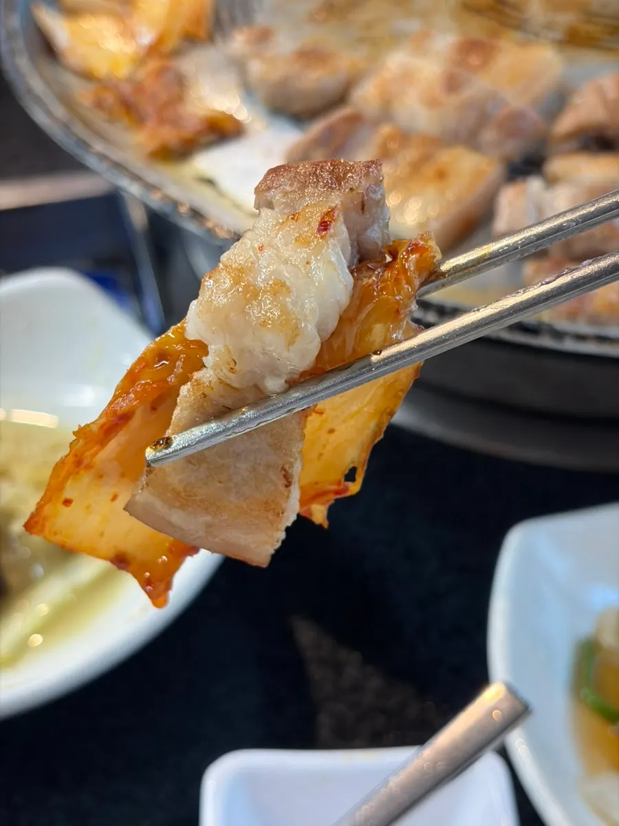 Pork belly, aged kimchi, and garlic combination