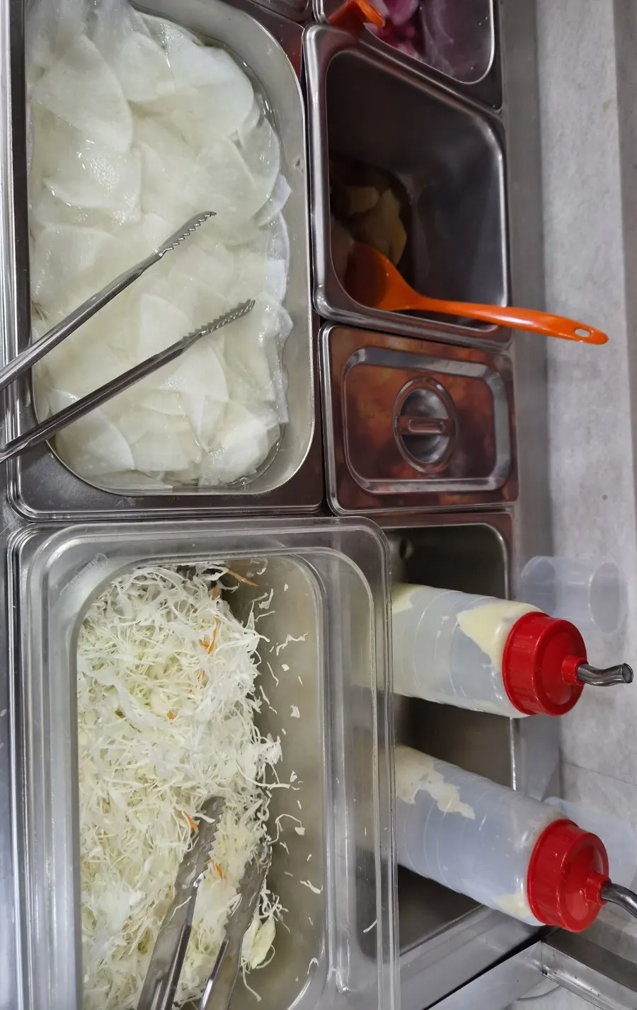 Self-serve cabbage and banchan corner