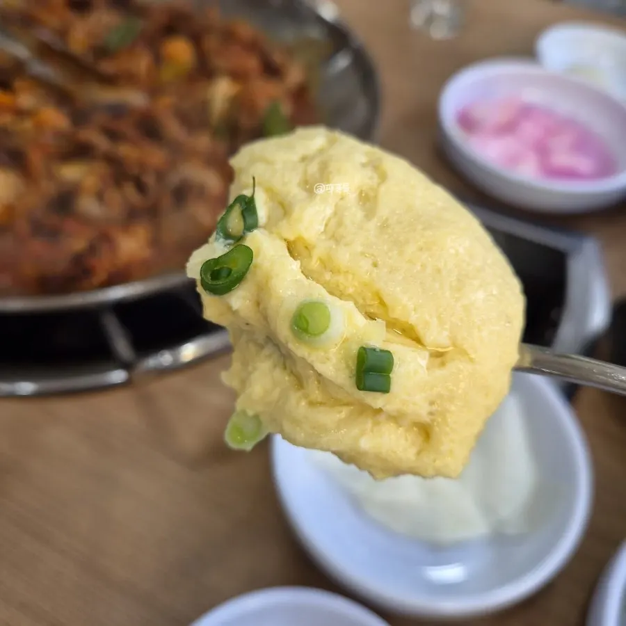 Hwasae jjukkumi topped with beef belly and shrimp