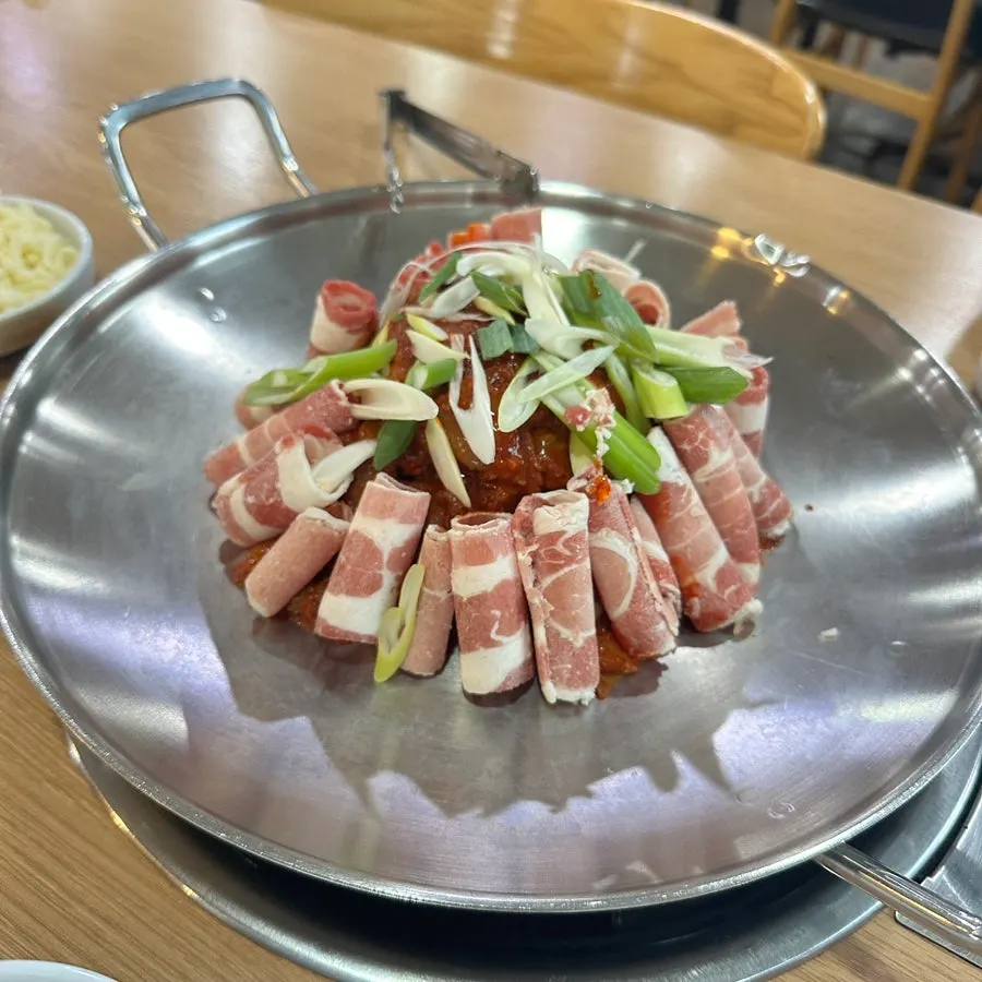 Volcano webfoot octopus wrapped in thin-sliced pork belly