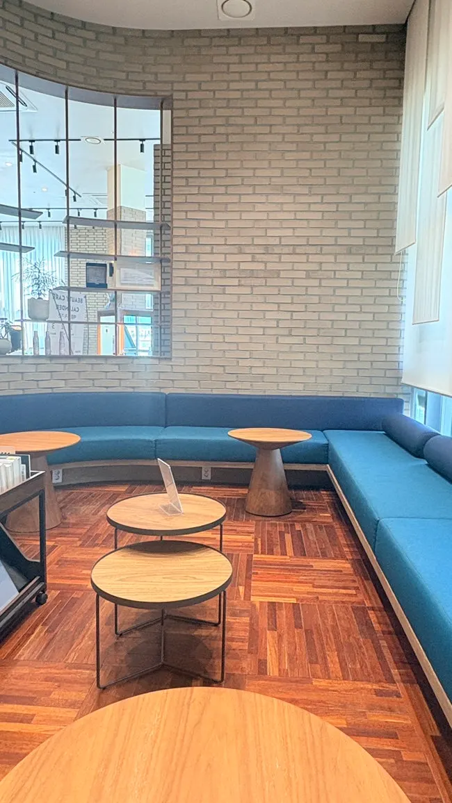 Salon interior with floor-to-ceiling windows