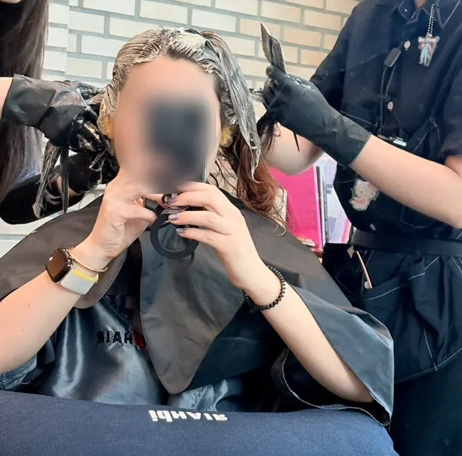 Starting to apply the tone-down hair color