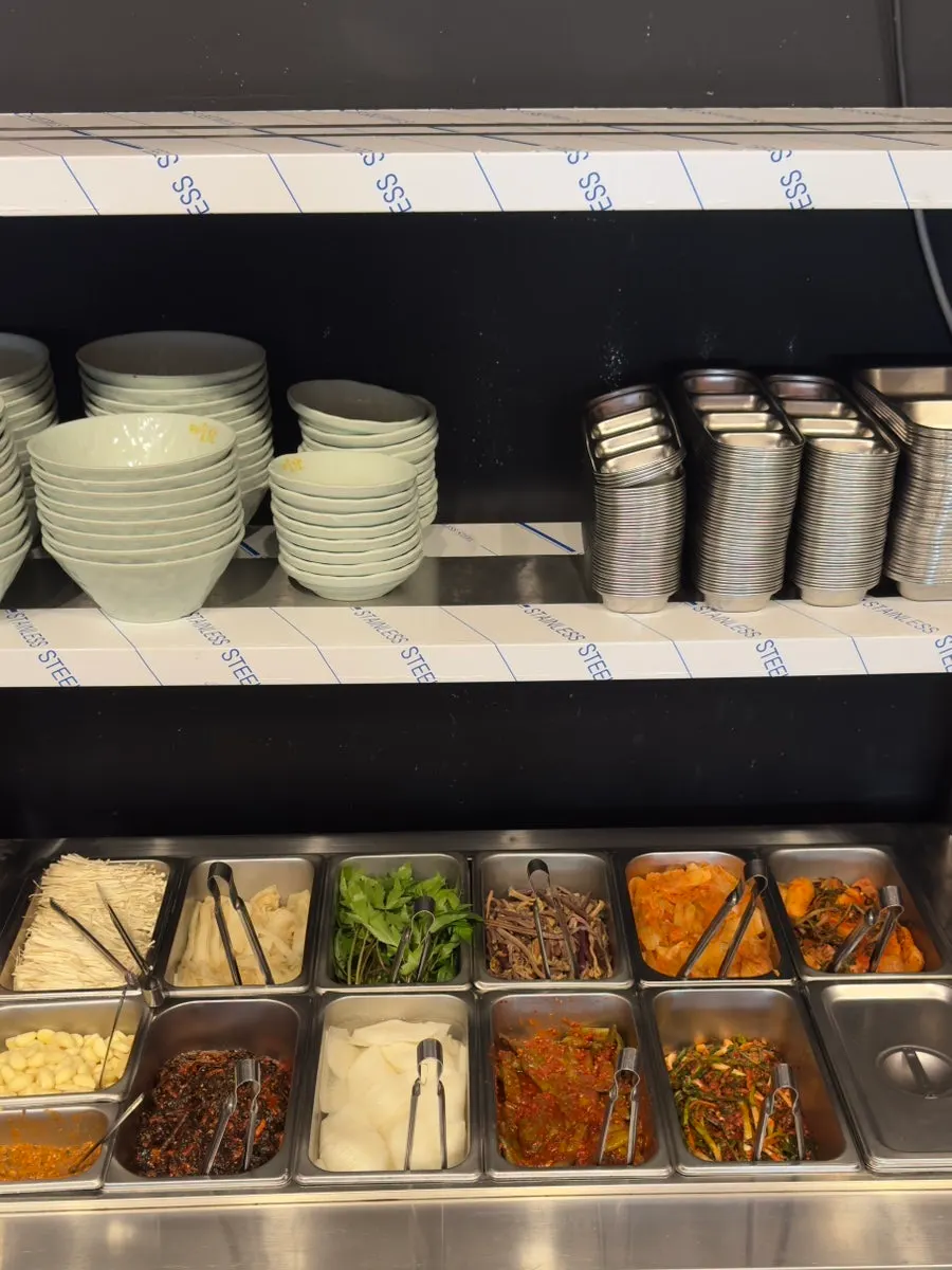 Self-service bar with ssam vegetables and side dishes
