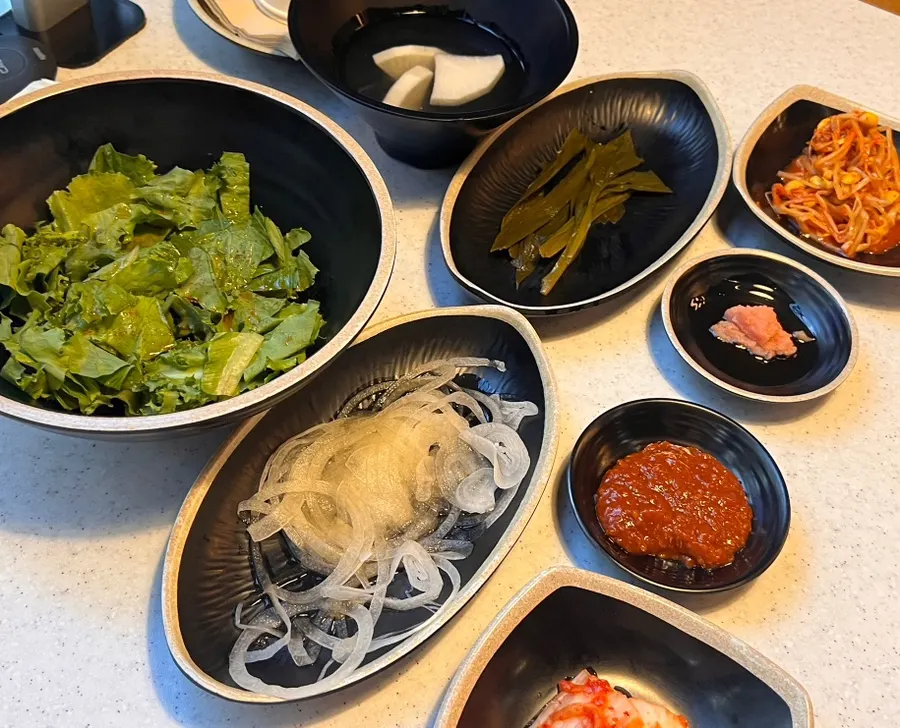 A variety of meat sauces and accompaniments