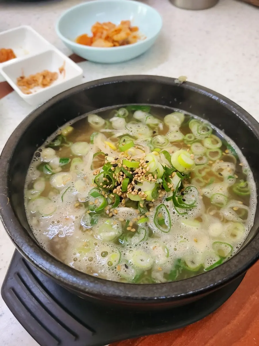 Yangban bean sprout soup served in an earthenware bowl