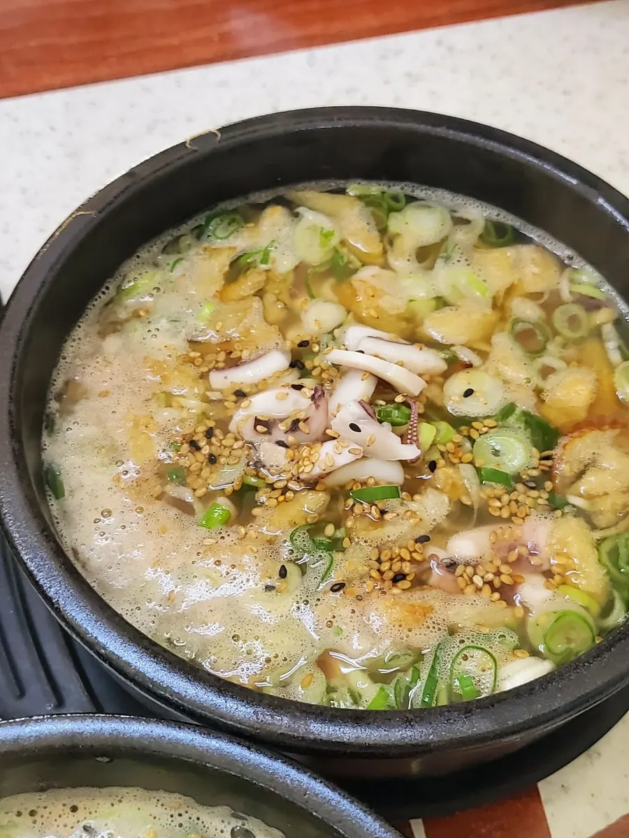 Hwangje bean sprout soup with squid and dried pollack