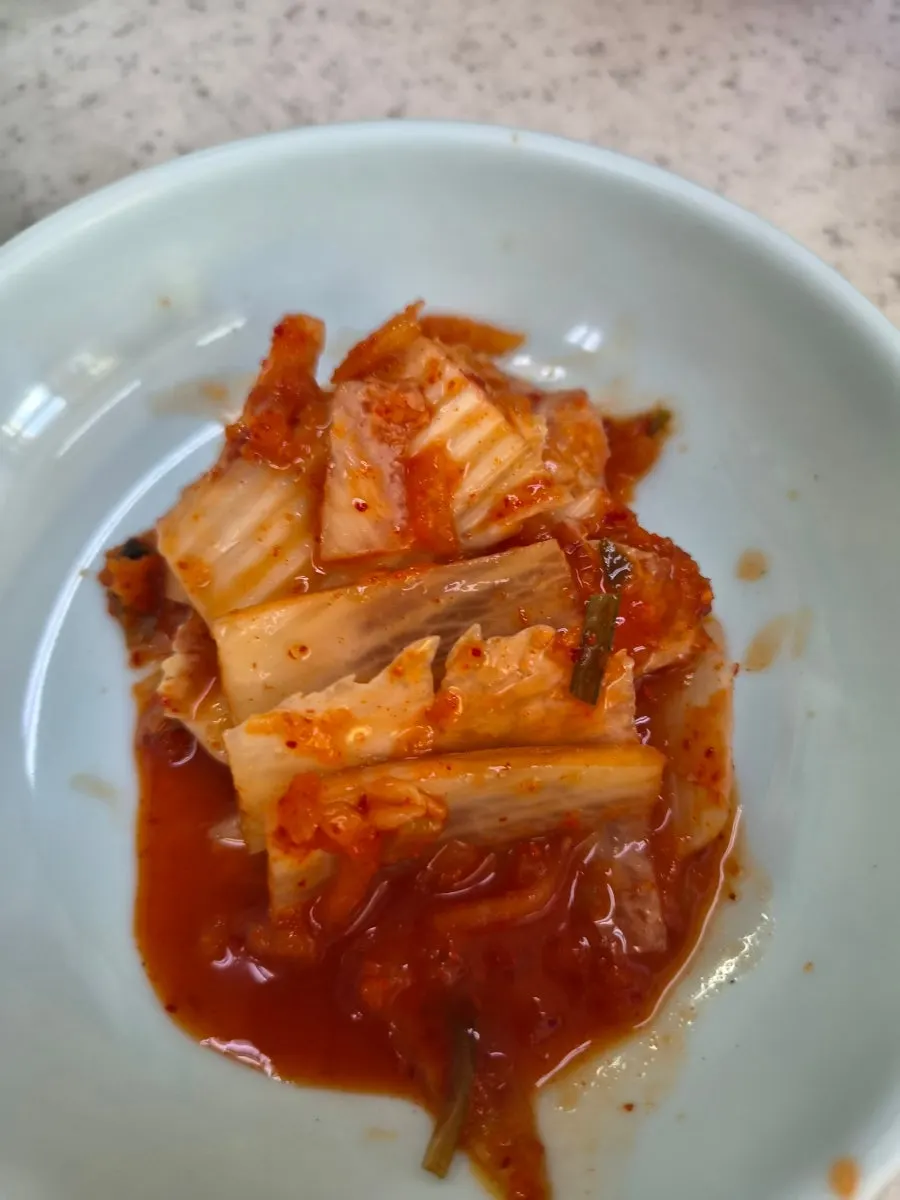 Self-serve kimchi and diced radish kimchi corner