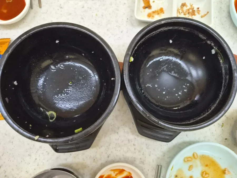 Two empty stone pots, completely finished