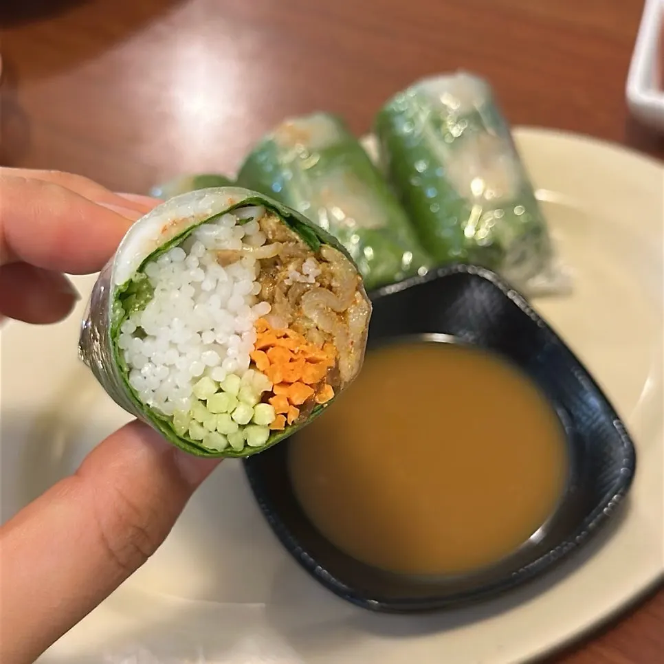 Phodam's spring rolls served with peanut sauce
