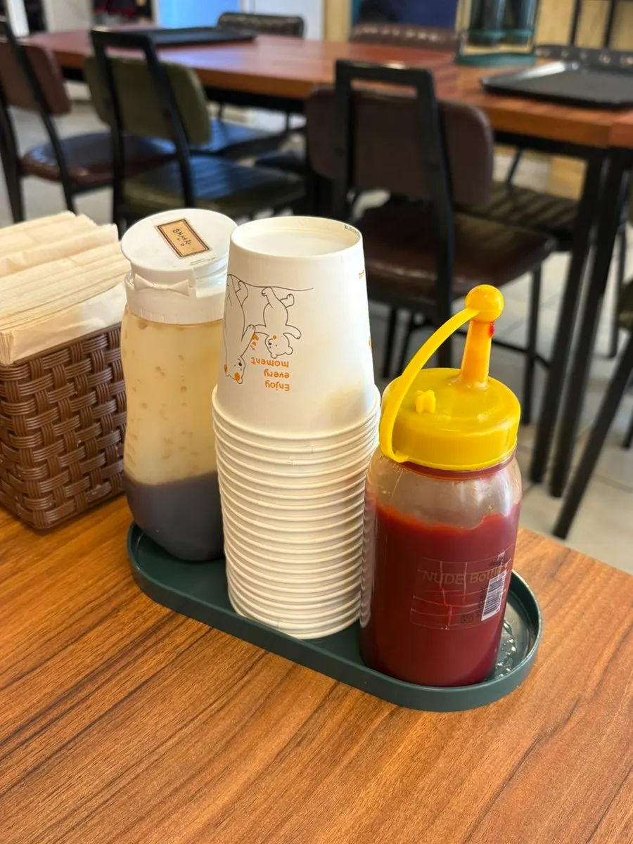 Hoisin sauce and sauces on the table