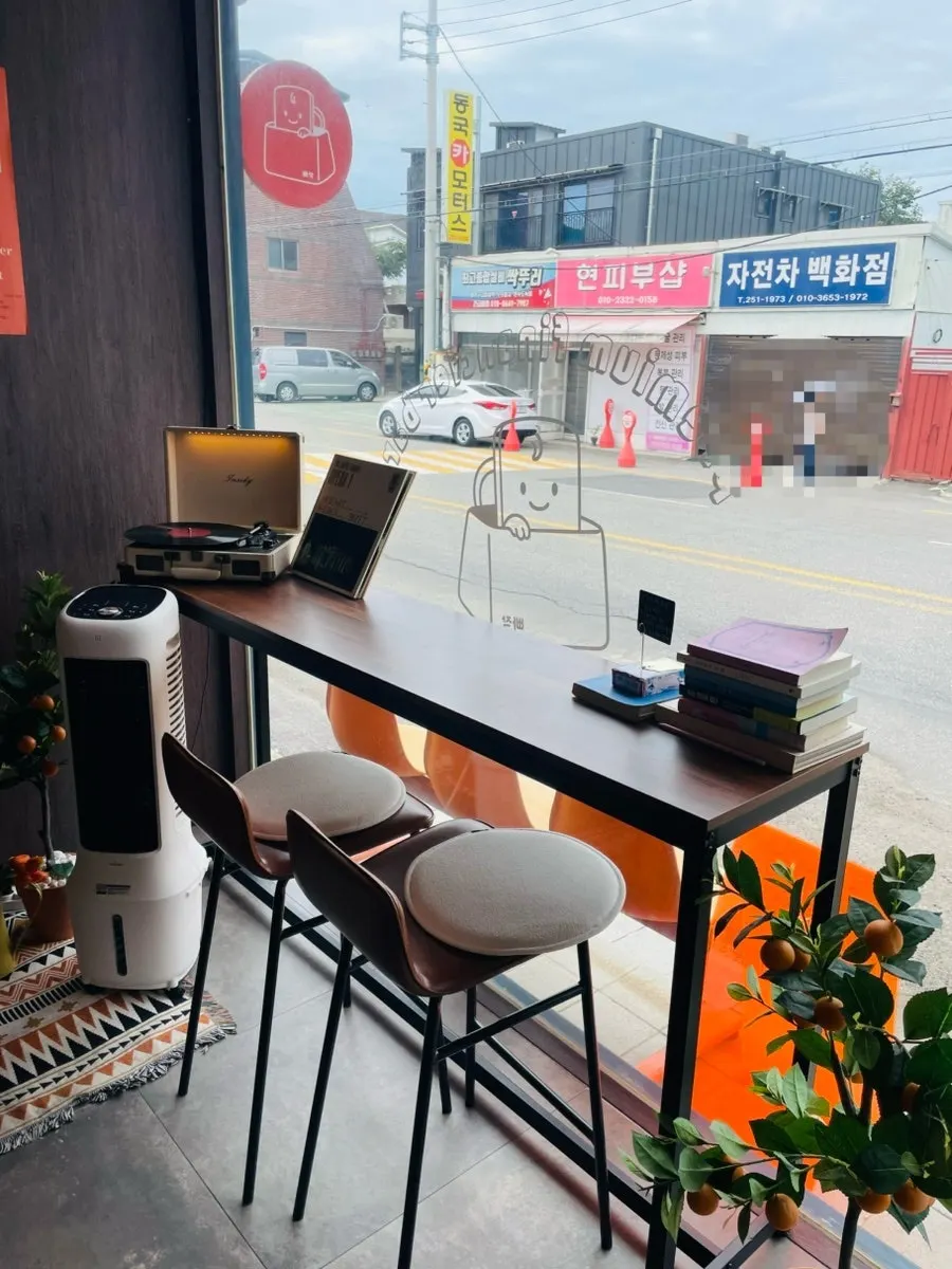 Cozy café seating decorated with props and plants