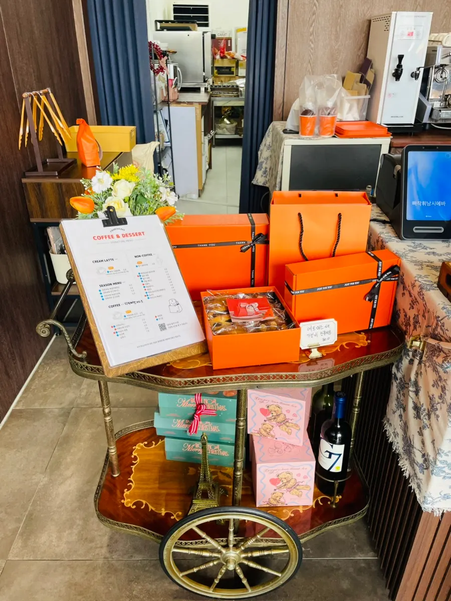 A corner of the store stacked with the shop's signature orange packaging boxes