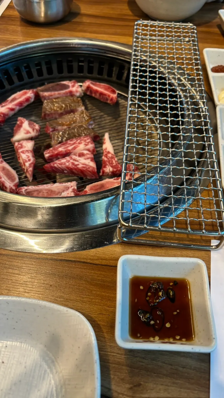 Soesaenggalbi grilling over charcoal