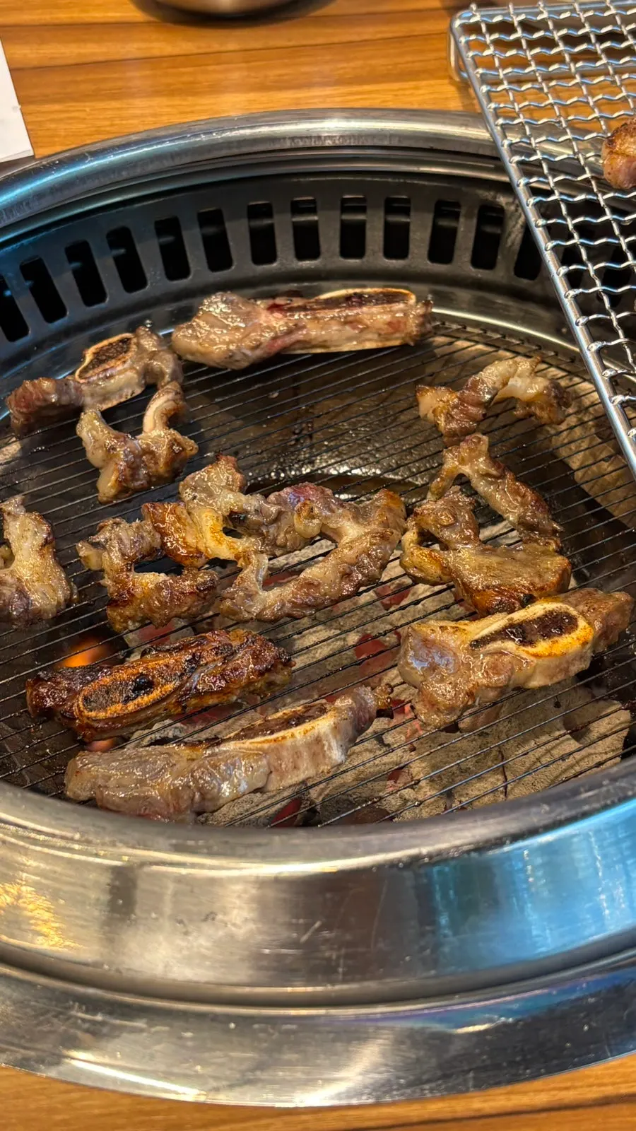 Deboned rib meat being grilled