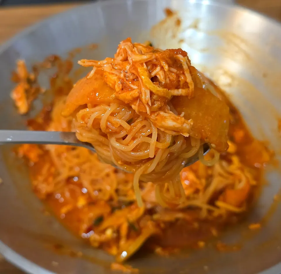 Chicken kalguksu spread served with silbi kimchi