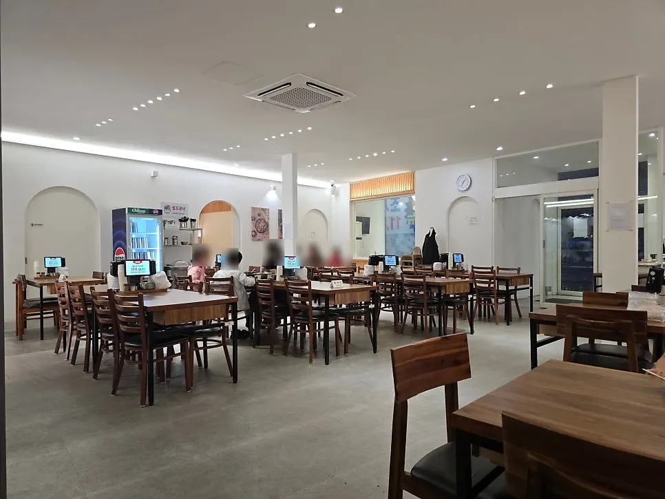 Quiet dining hall during early lunch hour