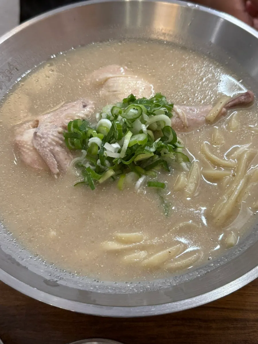Menu board for chicken kalguksu and side dishes
