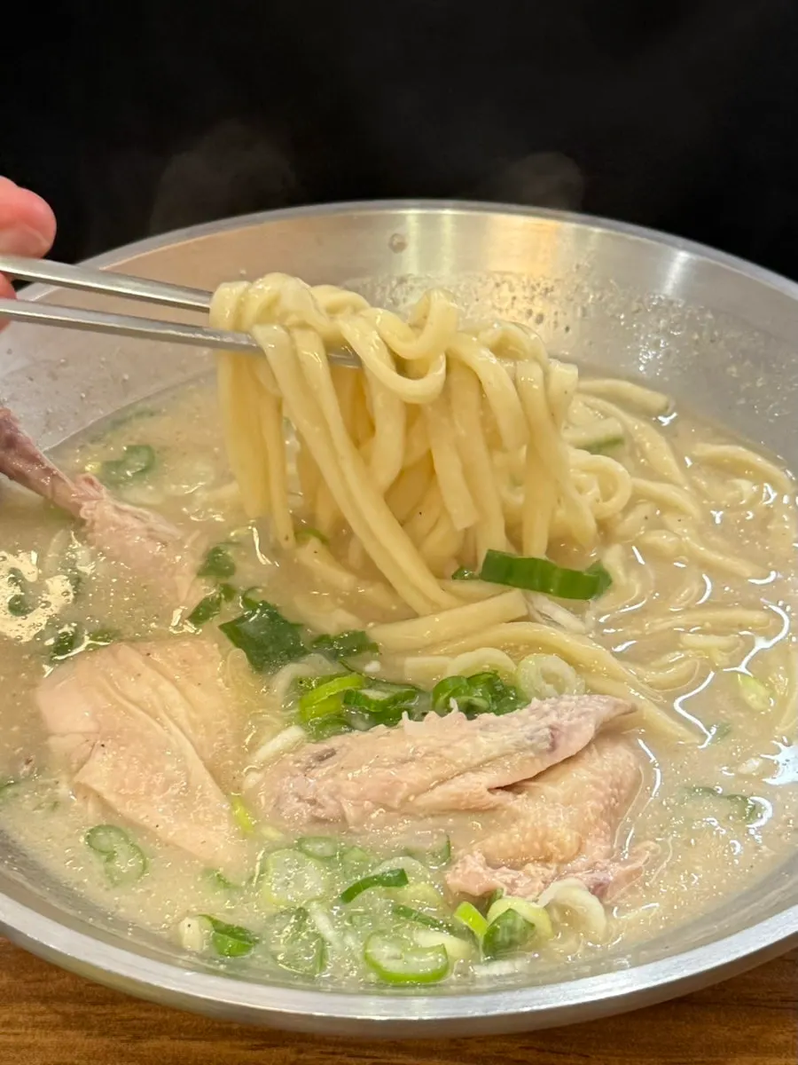 Rich chicken broth kalguksu with chicken
