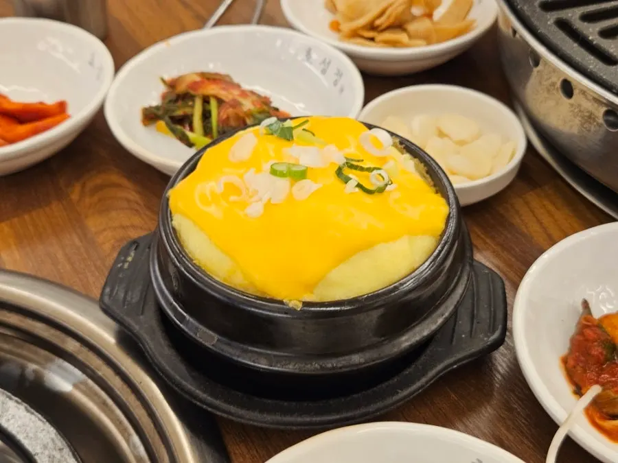 Sign for cheese steamed egg and grilled cheese menu