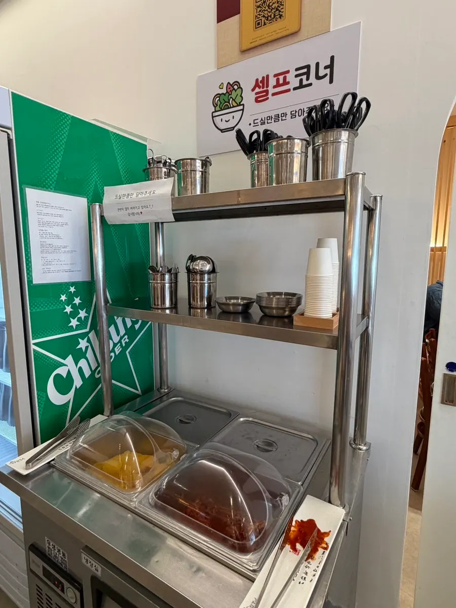 Self-serve bar with side dishes and kids' forks