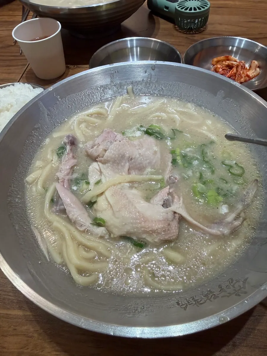 Chicken pieces inside the dak kalguksu