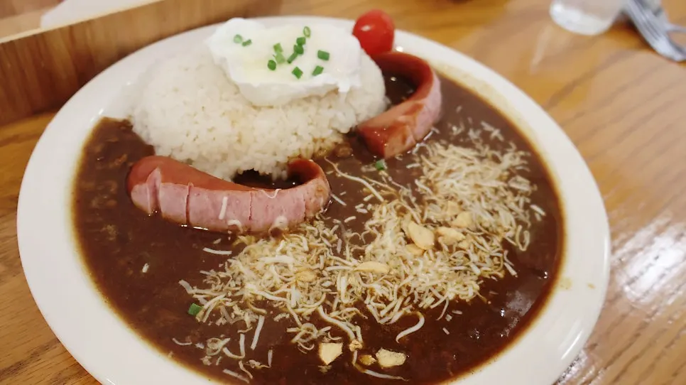 The deep-colored Sarugak curry