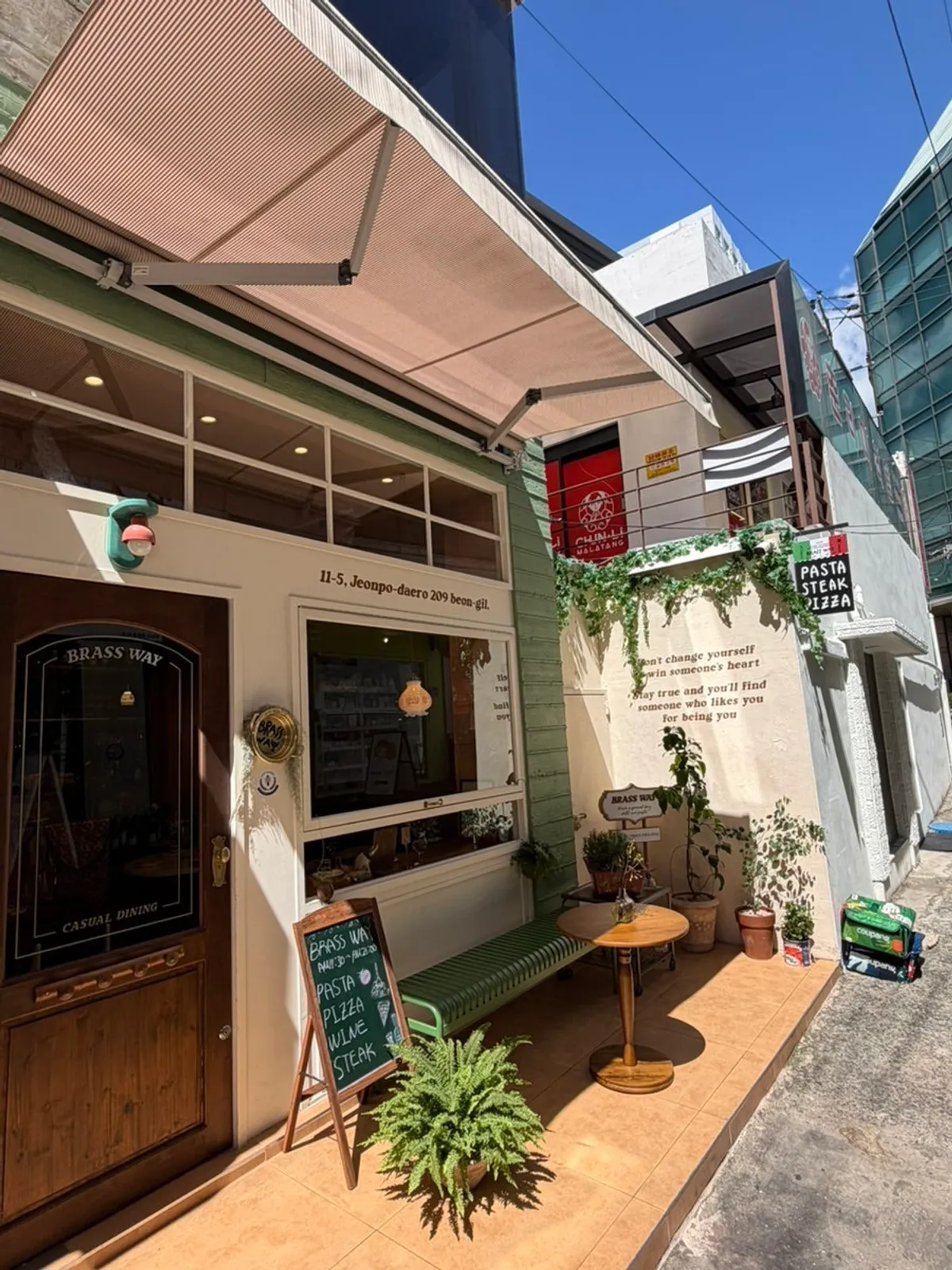 Brassway's exterior and signage in the Jeonpo café street alley