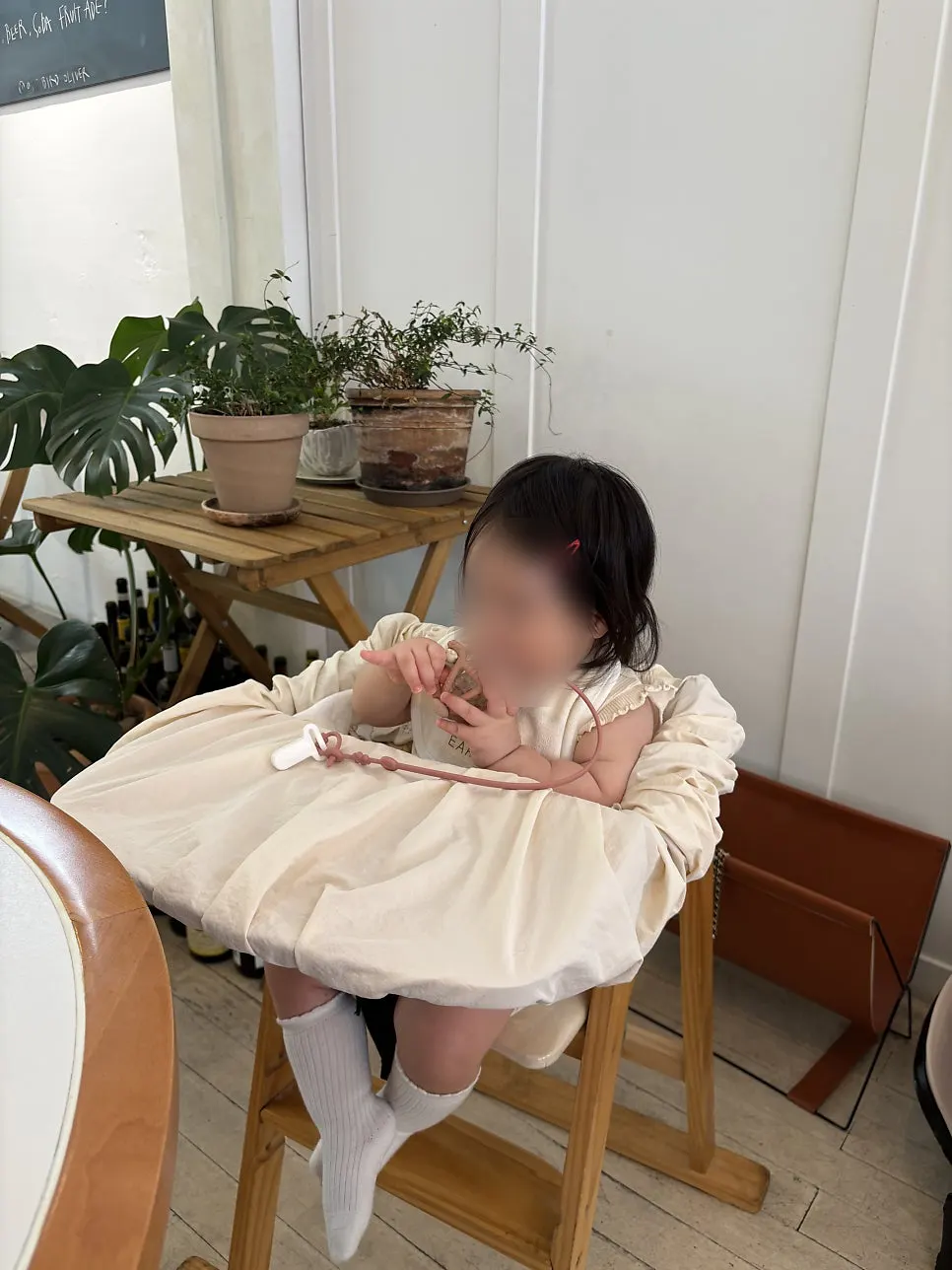 Staff bringing out a baby chair
