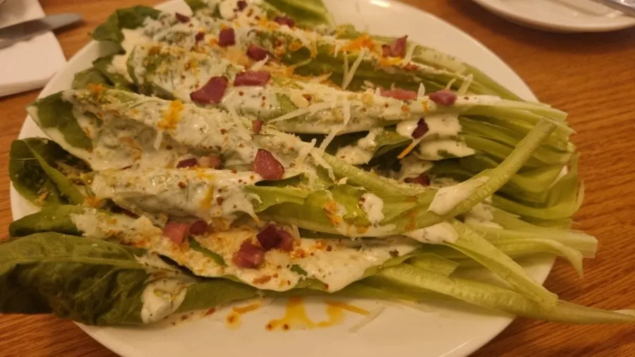 Romaine salad with ranch dressing and bacon