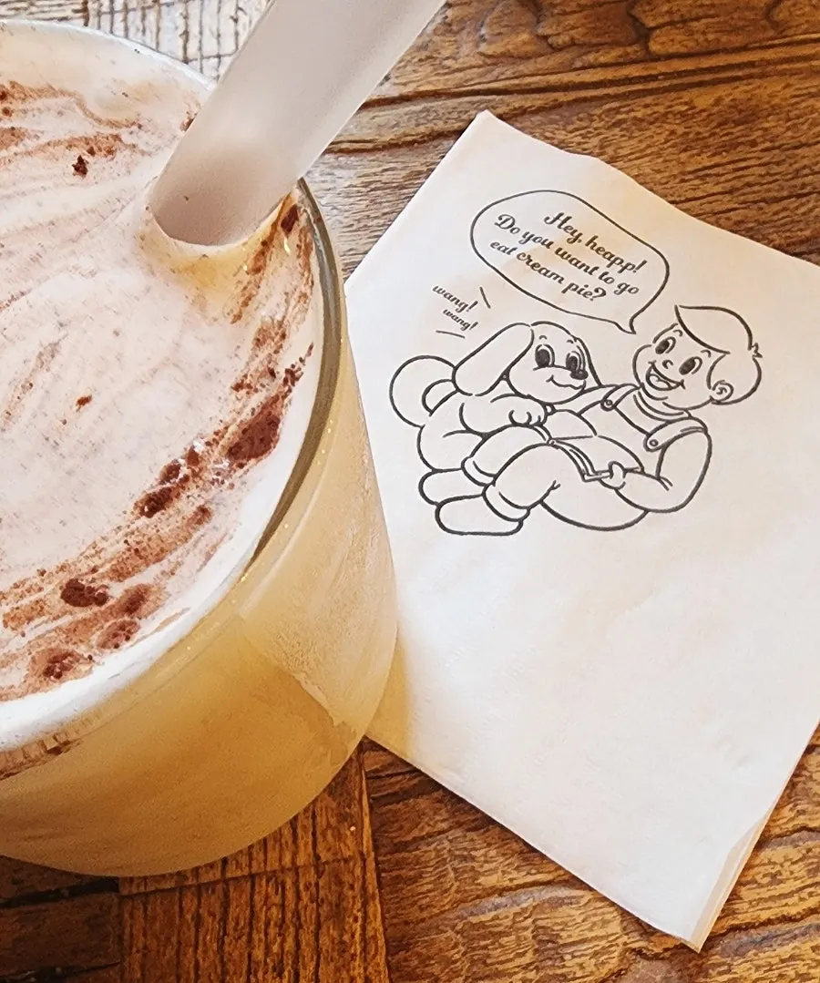 Hippy latte and two desserts on the table