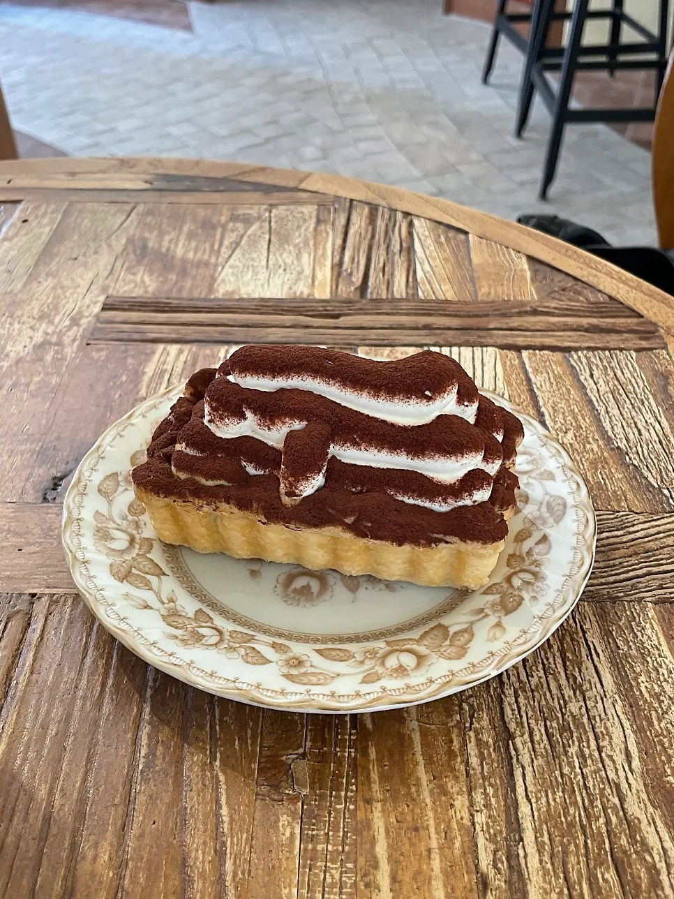 Ordered tiramisu cream pie with two drinks