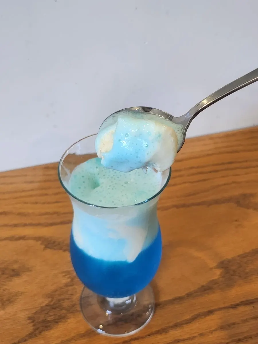 A glass of candy bar-flavored cream soda