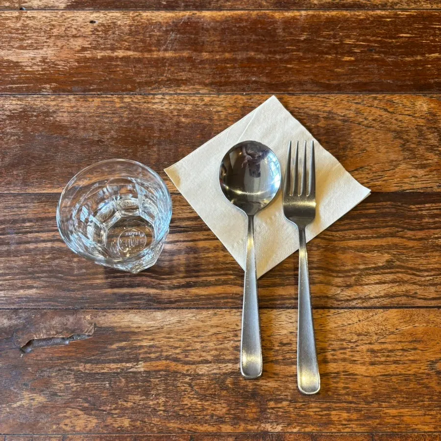 Utensils and napkins set at the table
