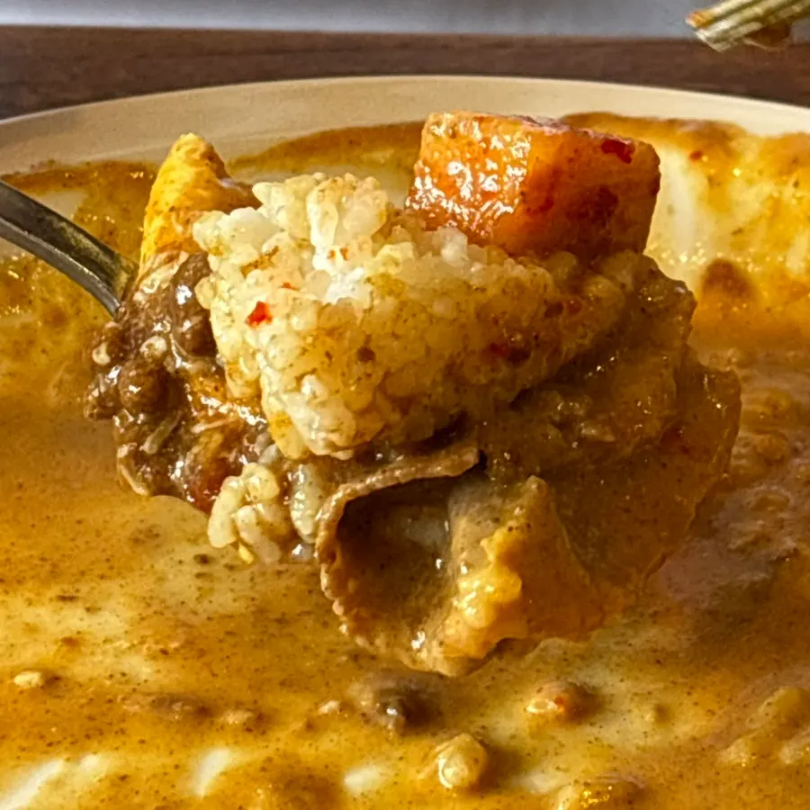 Cream curry mixed into fluffy rice