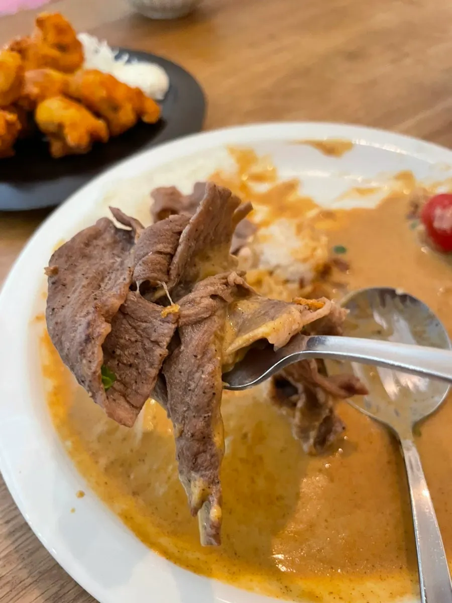 Sarugak20's signature cream curry topped with brisket