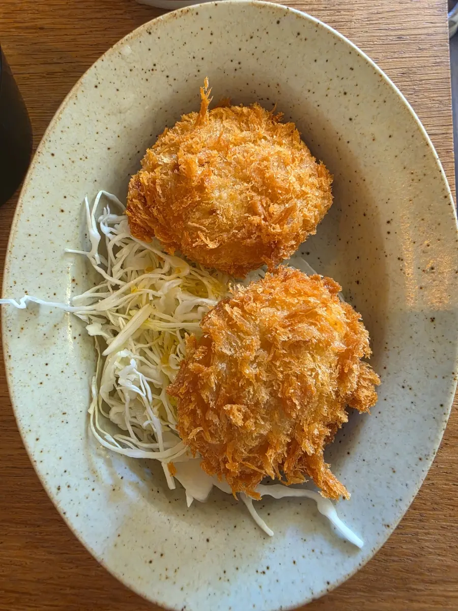 Two pieces of sausage as a side dish