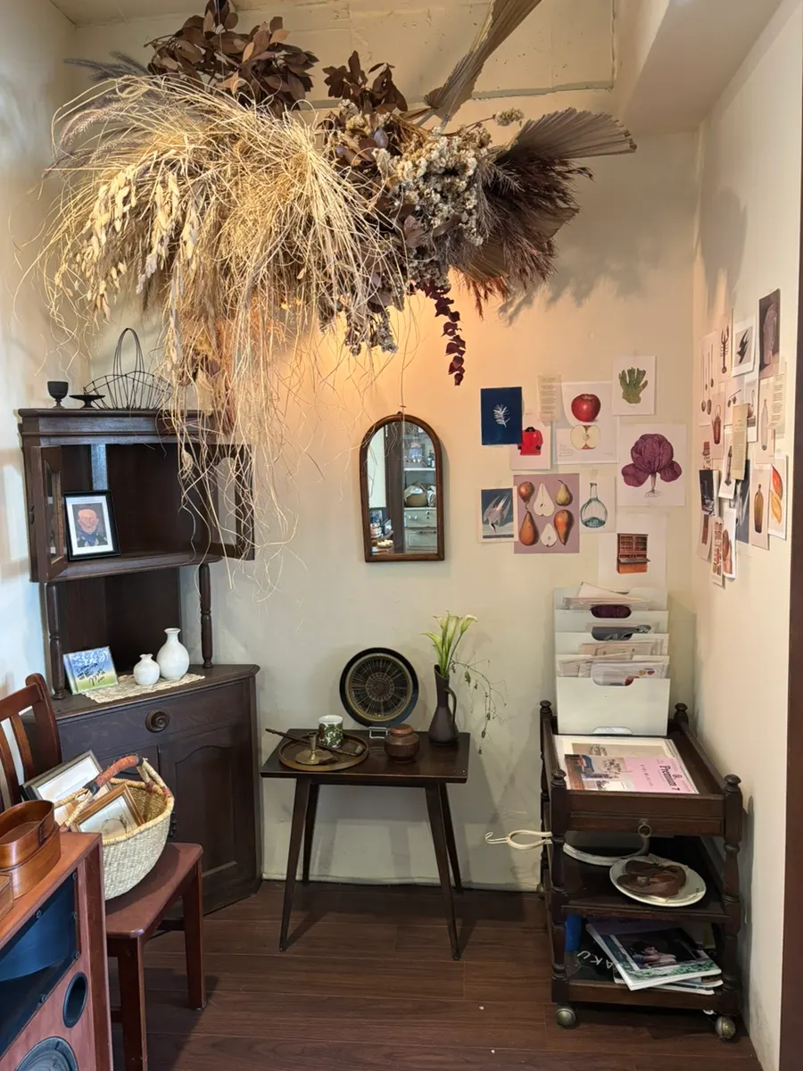 Entrance corner with a white blouse hanging